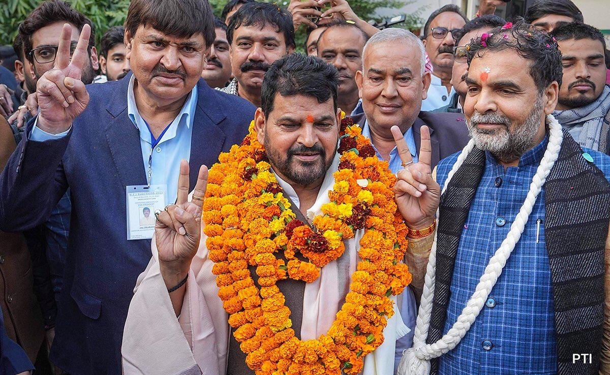 sanjay singh with brij bhushan,former WFI president